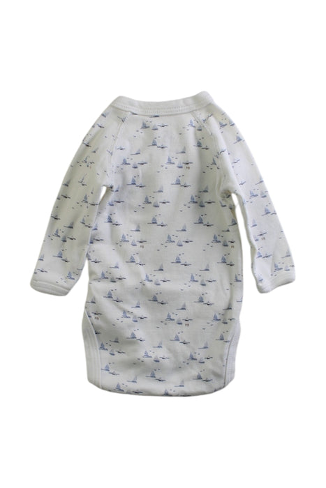 A White Long Sleeve Bodysuits from Petit Bateau in size Newborn for boy. (Back View)