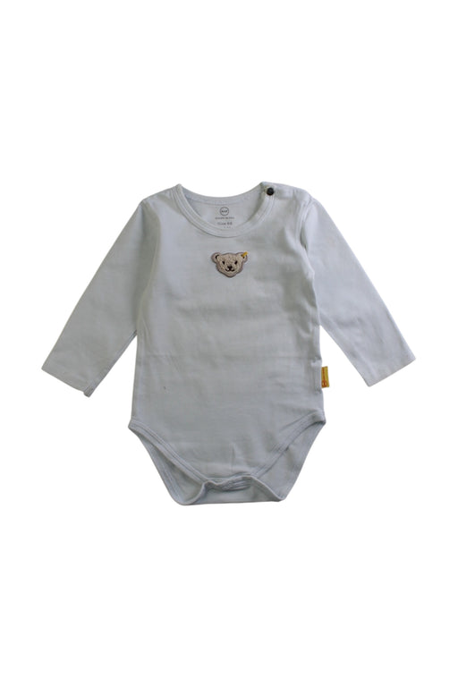 A White Long Sleeve Bodysuits from Steiff in size 3-6M for neutral. (Front View)