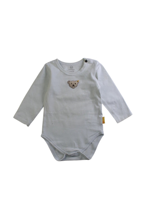 A White Long Sleeve Bodysuits from Steiff in size 3-6M for neutral. (Front View)