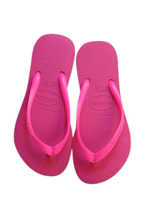 A Pink Flip Flops from Havaianas in size 4T for girl. (Back View)