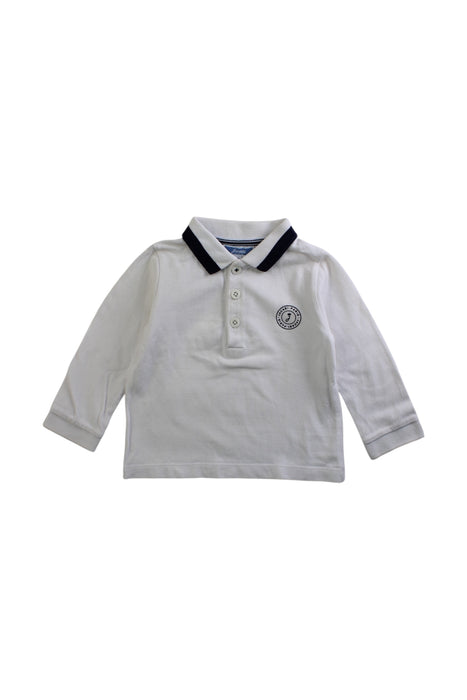 A White Long Sleeve Polos from Jacadi in size 6-12M for boy. (Front View)