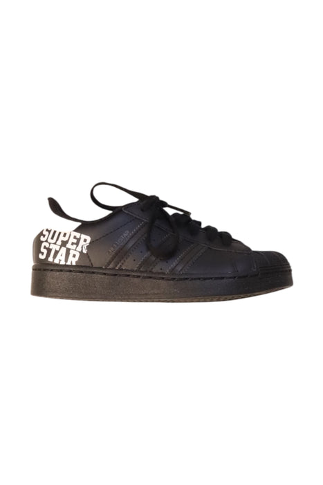 A Black Sneakers from Adidas in size 6T for neutral. (Front View)