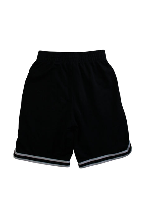 A Black Shorts from Nike in size 12Y for boy. (Back View)