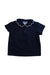 A Navy Short Sleeve Polos from Jacadi in size 4T for girl. (Front View)
