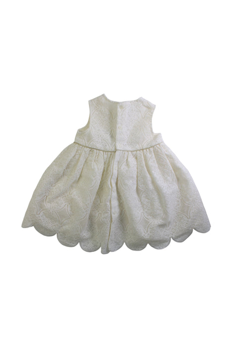 A Ivory Sleeveless Dresses from Mamas & Papas in size 6-12M for girl. (Back View)