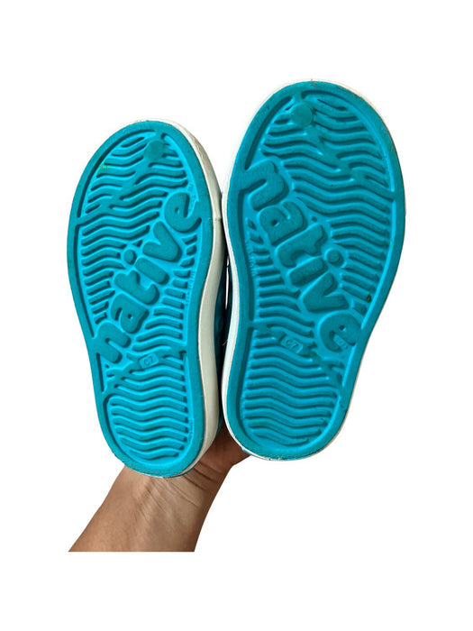 A Teal Slip Ons from Native Shoes in size 18-24M for neutral. (Back View)