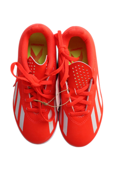 A Orange Cleats/Soccer Shoes from Adidas in size 6T for boy. (Back View)