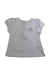 A White Short Sleeve Tops from Mides in size 6-12M for girl. (Front View)