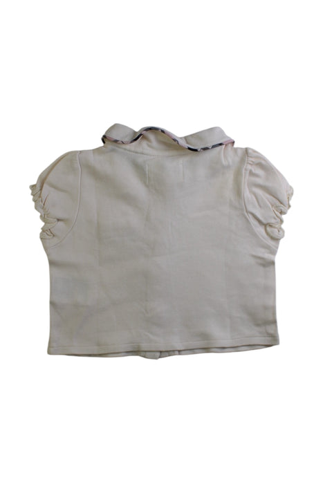 A Ivory Short Sleeve Tops from Chickeeduck in size 3-6M for girl. (Back View)