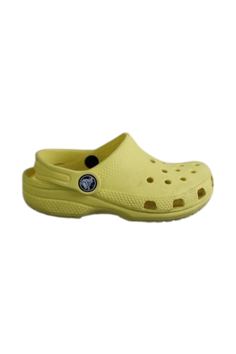 A Yellow Slip Ons from Crocs in size 3T for neutral. (Front View)