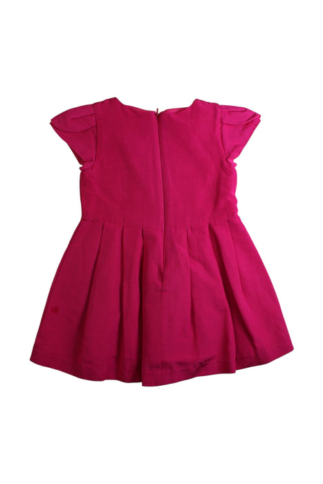 A Pink Short Sleeve Dresses from Jacadi in size 4T for girl. (Back View)