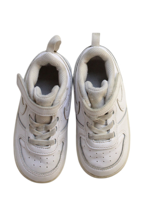 A White Sneakers from Nike in size 3T for girl. (Back View)