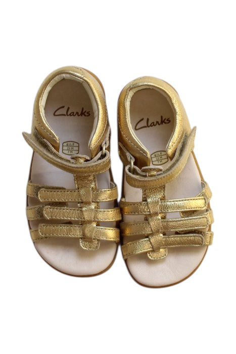 A Gold Sandals from Clarks in size 18-24M for girl. (Back View)