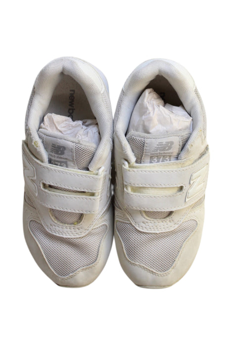 A White Sneakers from New Balance in size 6T for neutral. (Back View)