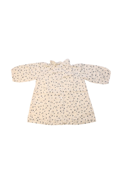 A Ivory Coats from Bonpoint in size 3-6M for girl. (Front View)