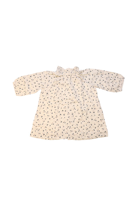 A Ivory Coats from Bonpoint in size 3-6M for girl. (Back View)