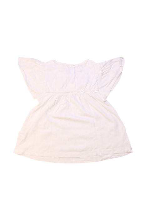 A White Short Sleeve Tops from purebaby in size 6-12M for girl. (Back View)