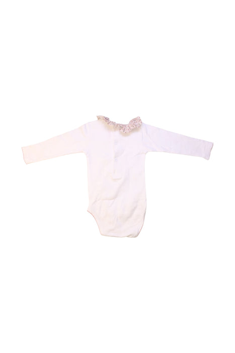 A White Long Sleeve Bodysuits from La Coqueta in size 6-12M for girl. (Back View)