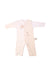 A White Onesies from Natures Purest in size 3-6M for girl. (Front View)