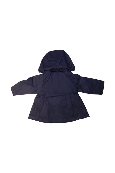 A Navy Coats from Jacadi in size 6-12M for girl. (Back View)
