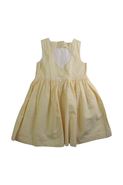 A Yellow Sleeveless Dresses from Confiture in size 4T for girl. (Back View)