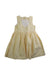 A Yellow Sleeveless Dresses from Confiture in size 4T for girl. (Back View)