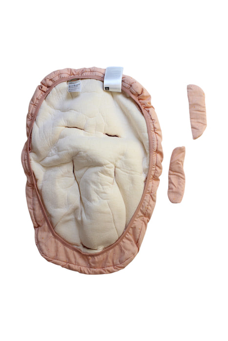 A Peach Changing Mats & Covers from Stokke in size Newborn for girl. (Back View)