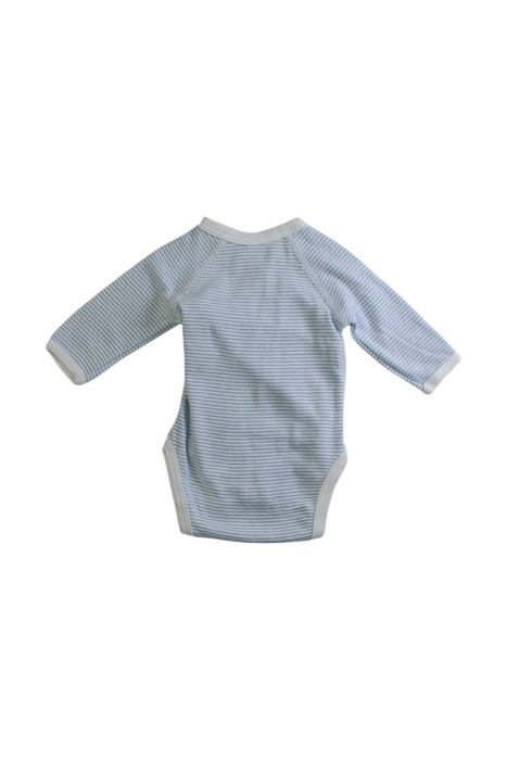 A Blue Long Sleeve Bodysuits from Petit Bateau in size Newborn for boy. (Back View)