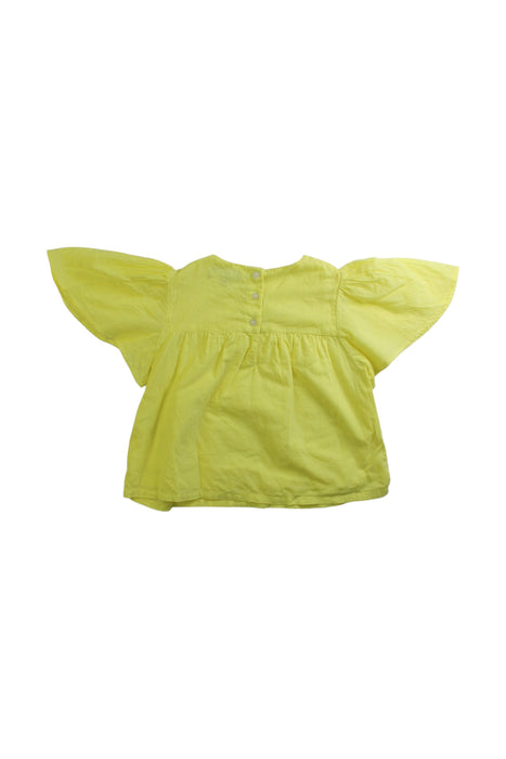 A Yellow Short Sleeve Tops from Velveteen in size 6T for girl. (Back View)