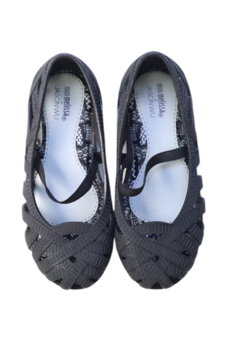 A Black Flats from Mini Melissa Jason Wu in size 5T for girl. (Back View)