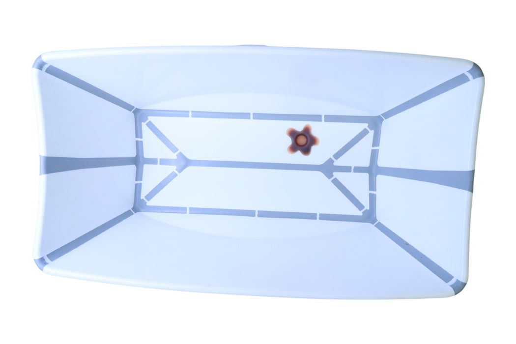 A White Changing Mats & Covers from Stokke in size O/S for neutral. (Front View)