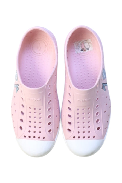 A Pink Slip Ons from Native Shoes in size 7Y for girl. (Back View)