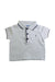 A White Short Sleeve Polos from Jacadi in size 3-6M for boy. (Front View)