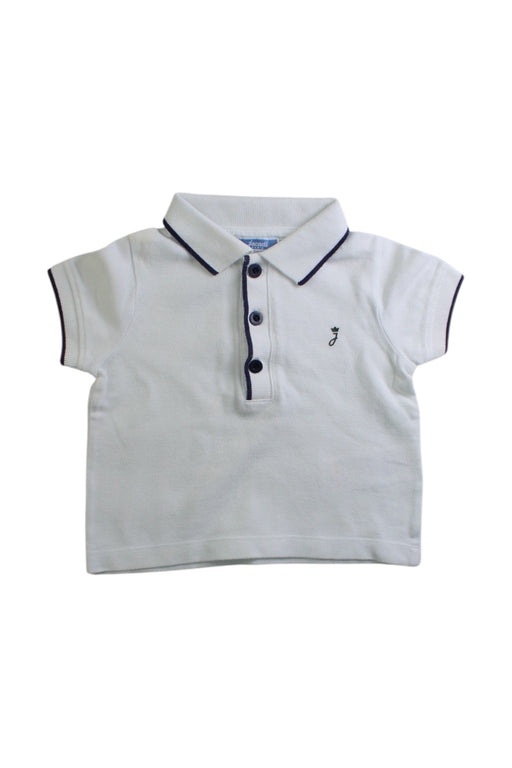 A White Short Sleeve Polos from Jacadi in size 3-6M for boy. (Front View)