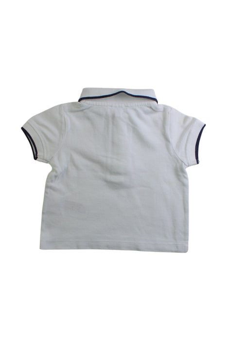 A White Short Sleeve Polos from Jacadi in size 3-6M for boy. (Back View)
