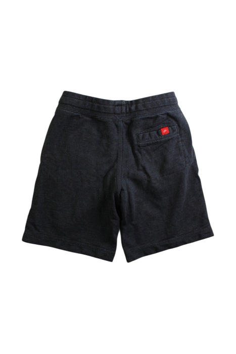 A Black Shorts from Nike in size 5T for boy. (Back View)