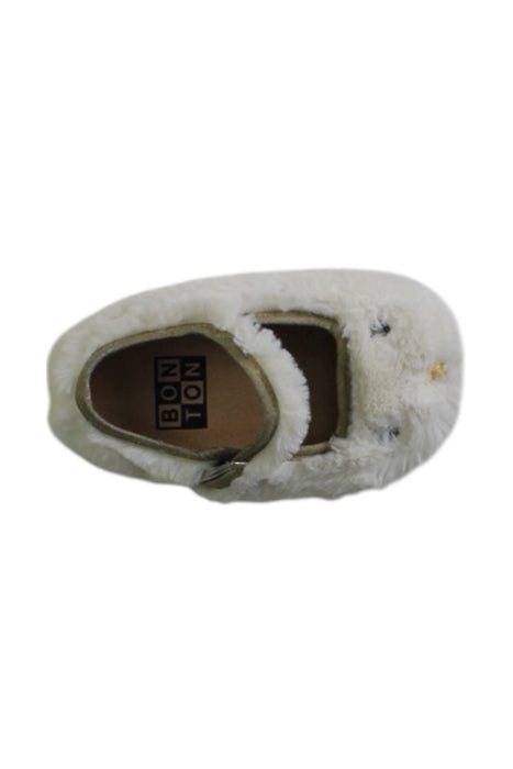 A White Slippers from Bonton in size 12-18M for girl. (Front View)