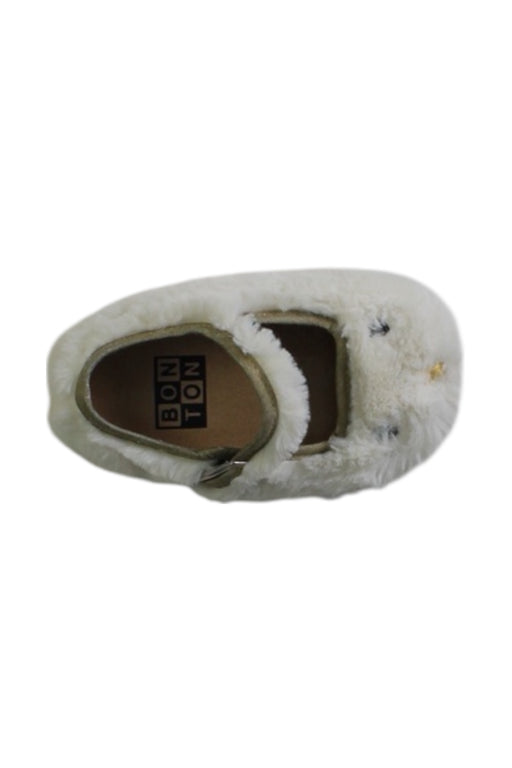 A White Slippers from Bonton in size 12-18M for girl. (Front View)