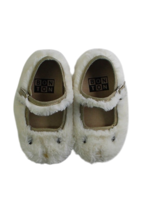 A White Slippers from Bonton in size 12-18M for girl. (Back View)