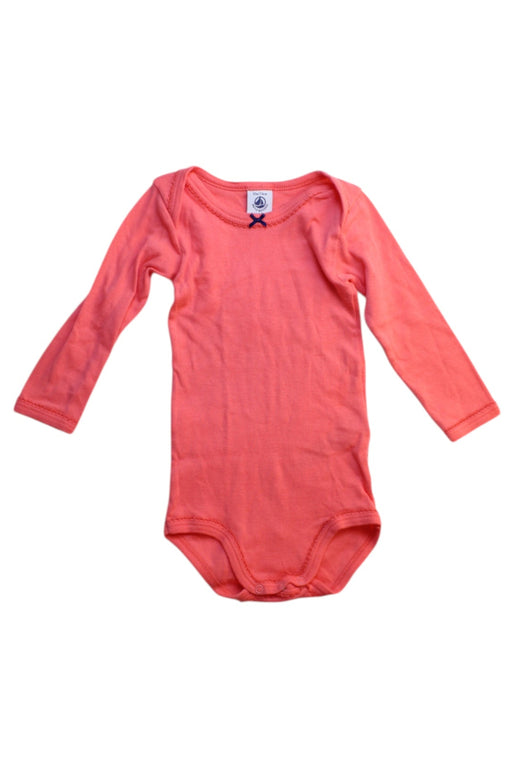 A Orange Long Sleeve Bodysuits from Petit Bateau in size 6-12M for girl. (Front View)