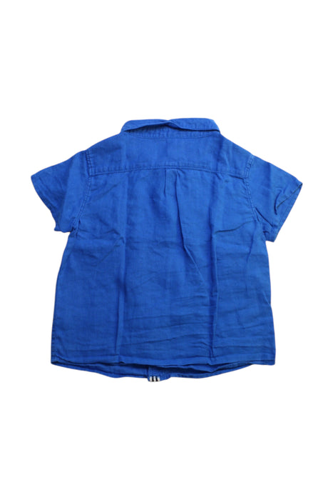 A Blue Short Sleeve Shirts from Petit Bateau in size 3T for boy. (Back View)