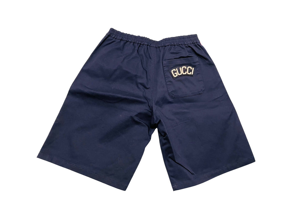 A Navy Shorts from Gucci in size 10Y for boy. (Back View)