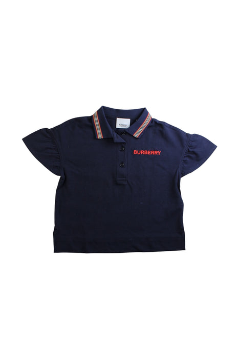A Navy Short Sleeve Polos from Burberry in size 6T for girl. (Front View)