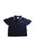 A Navy Short Sleeve Polos from Burberry in size 6T for girl. (Front View)