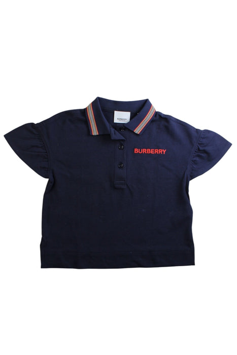A Navy Short Sleeve Polos from Burberry in size 6T for girl. (Front View)