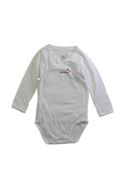 A White Long Sleeve Bodysuits from Petit Bateau in size 12-18M for girl. (Front View)