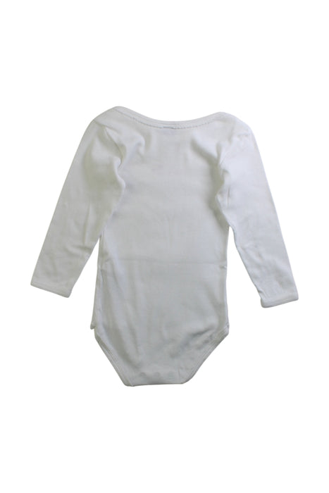 A White Long Sleeve Bodysuits from Petit Bateau in size 2T for girl. (Back View)