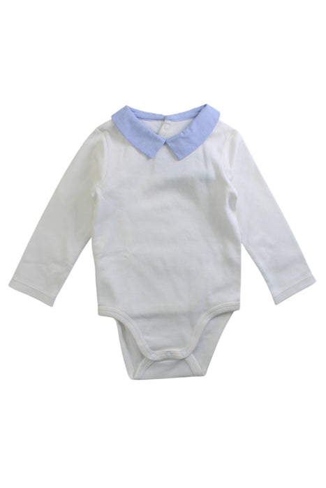 A White Long Sleeve Bodysuits from Jacadi in size 6-12M for boy. (Front View)