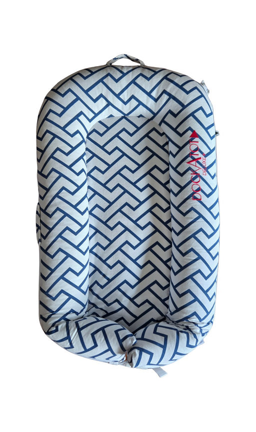 A Blue Other Gear from DockATot in size 3-6M for neutral. (Front View)