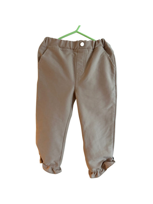 A Beige Casual Pants from Petit Main in size 5T for girl. (Front View)